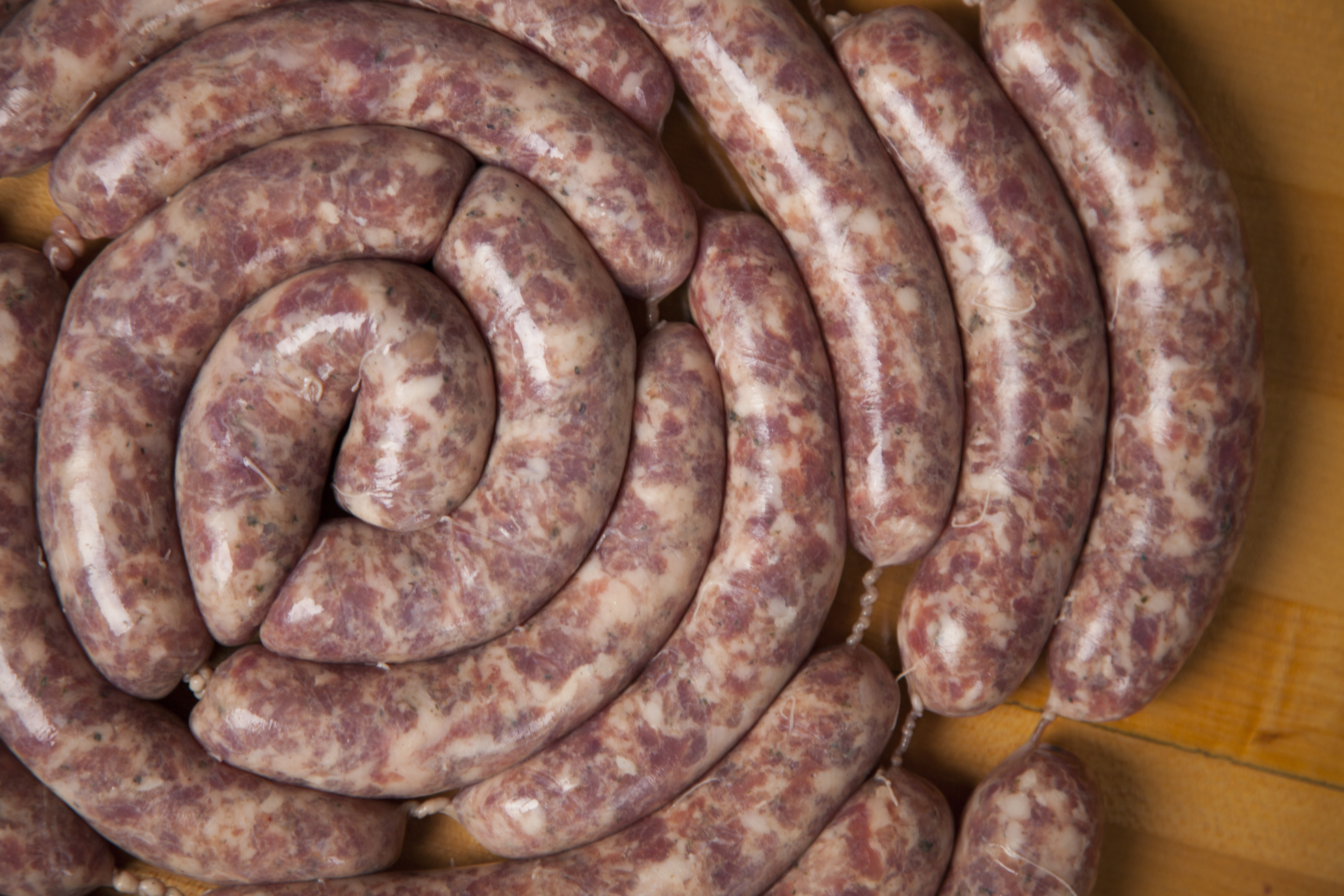 stuffing sausage casings with meat grinder